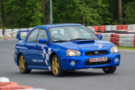 Driving behind the wheel of a Subaru Impreza on the track (3 laps)