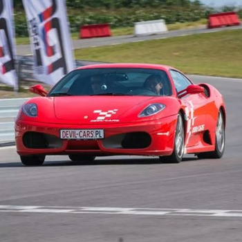 Driving behind the wheel of a Ferrari F430 around the track (2 laps)